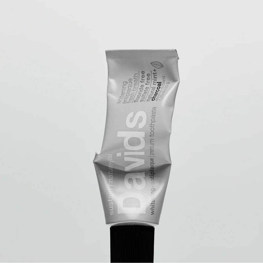 Davids travel size premium toothpaste / charcoal+peppermint